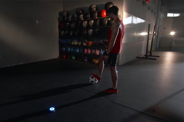 Man training soccer football drill using BlazePod wireless modules
