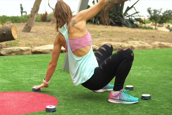 Woman trains outdoors with BlazePods fitness technology