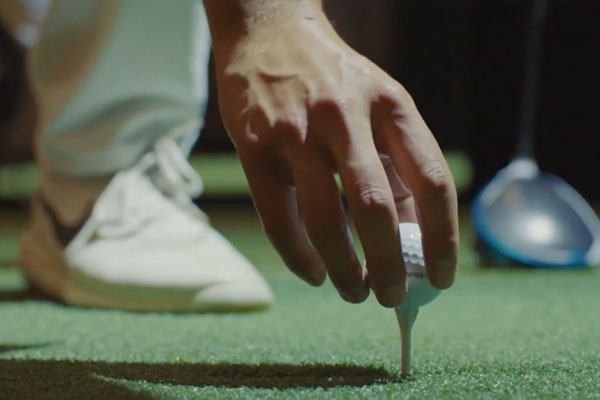 Golfin IDRA 2 golf simulator showcased at a corporate event
