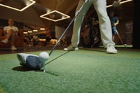 Golf simulator event-based attraction